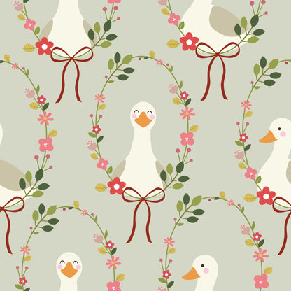 Babies Nursery Wallpaper in pale green  featuring cute, happy ducks adorned with a halo of colorful flowers and a charming ribbon bow. 