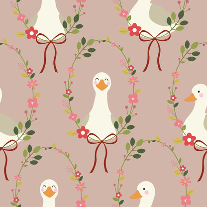 Babies Nursery Wallpaper in dusky pink featuring cute, happy ducks adorned with a halo of colorful flowers and a charming ribbon bow. 